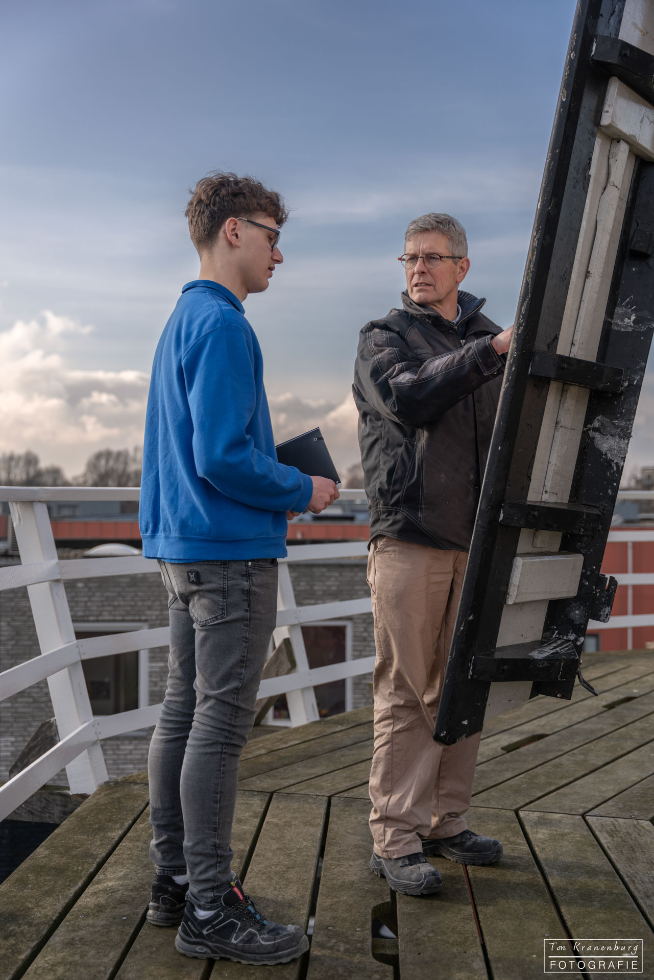 Molenaar instructeur met leerling molenaar